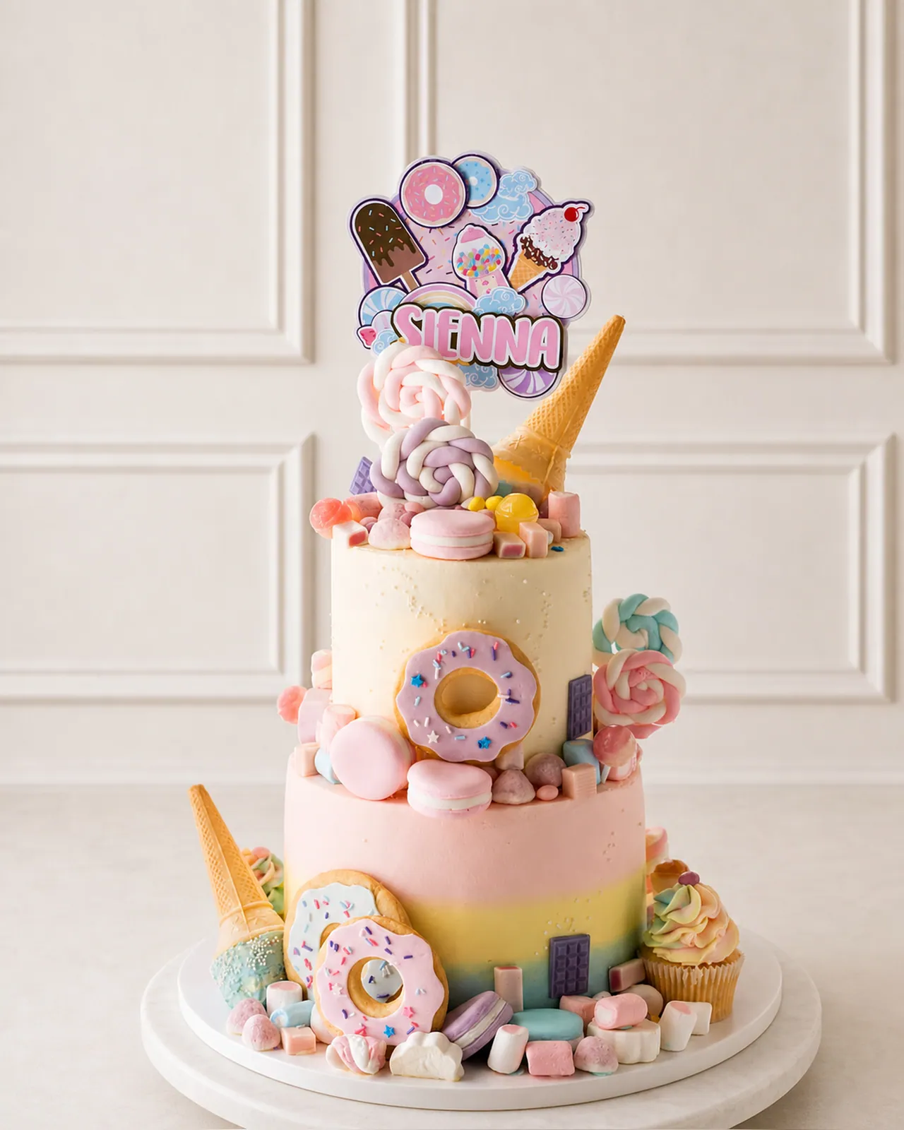 Two-tier candy and donut cake