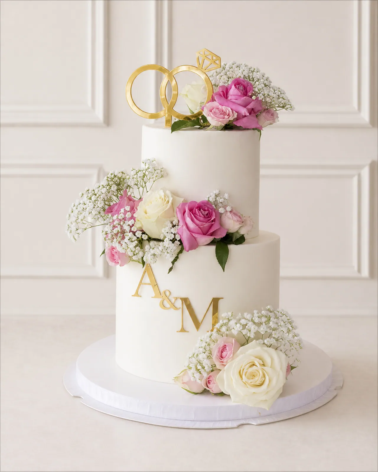 Two-tier engagement cake with roses