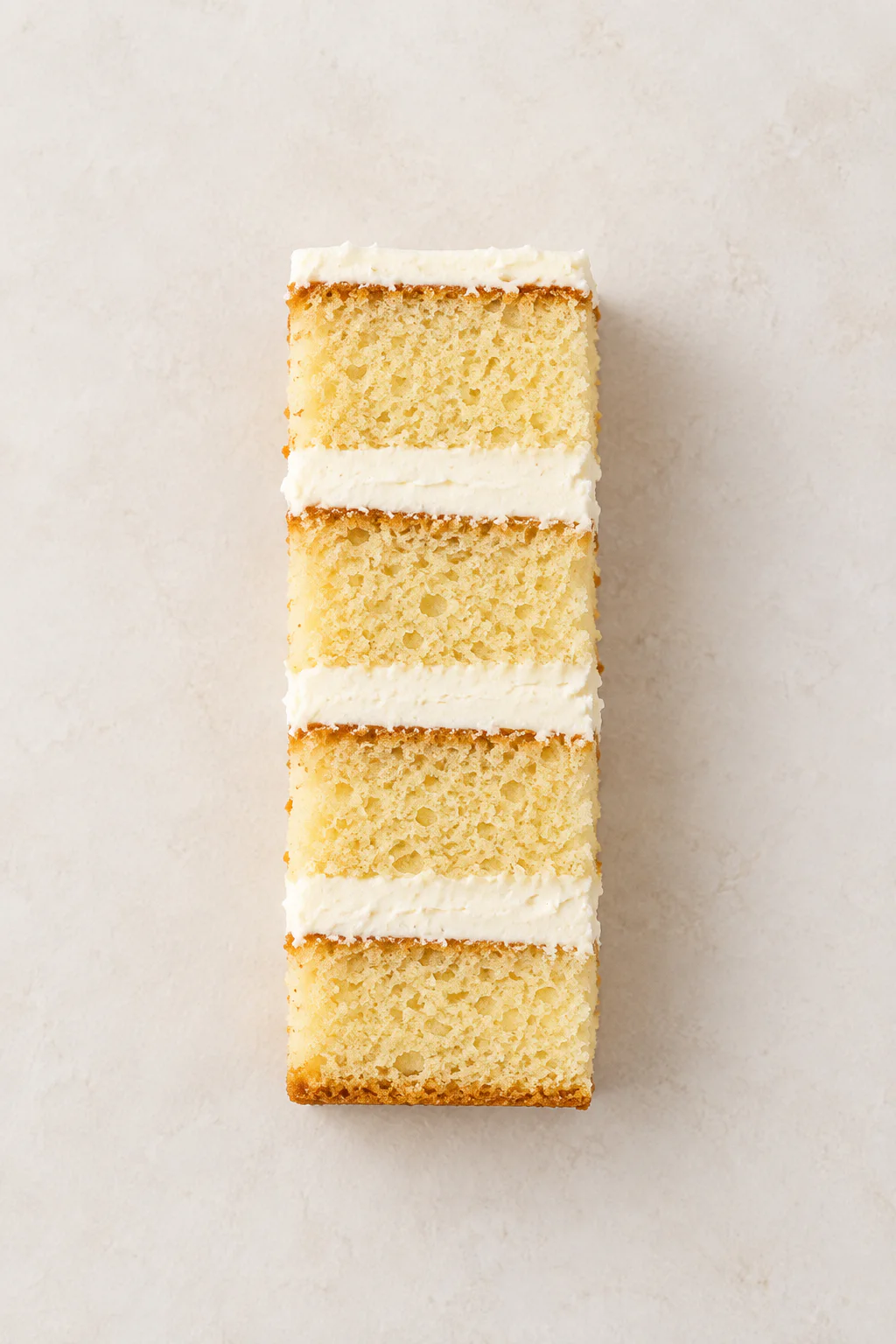 A cut slice of Vanilla cake