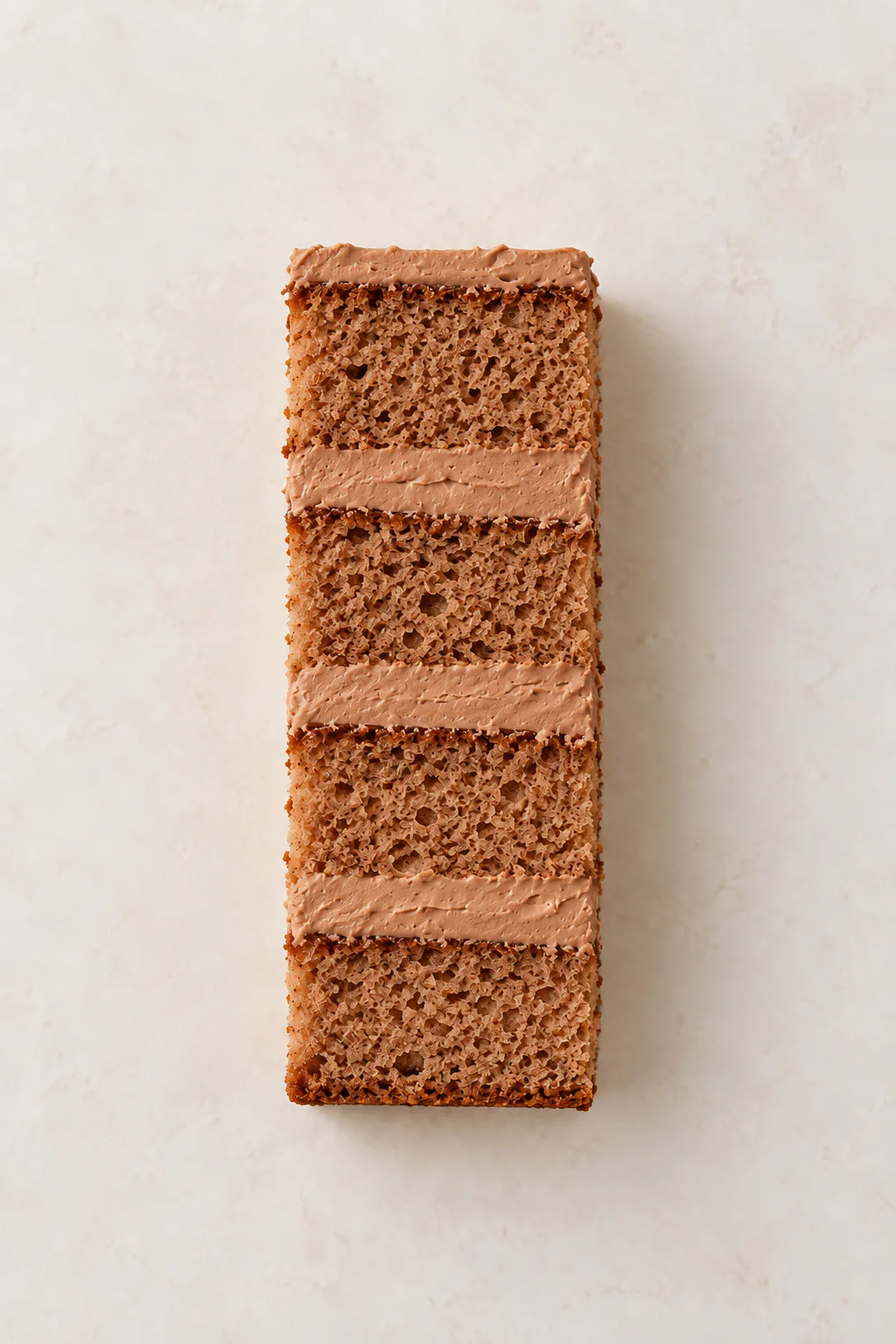 A cut slice of Milk Chocolate cake