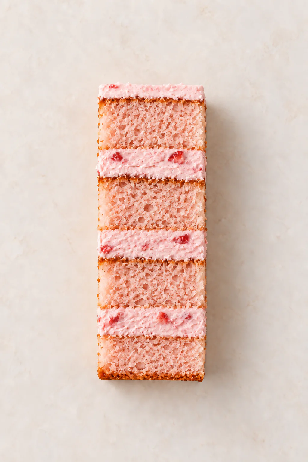 A cut slice of Strawberry Cake