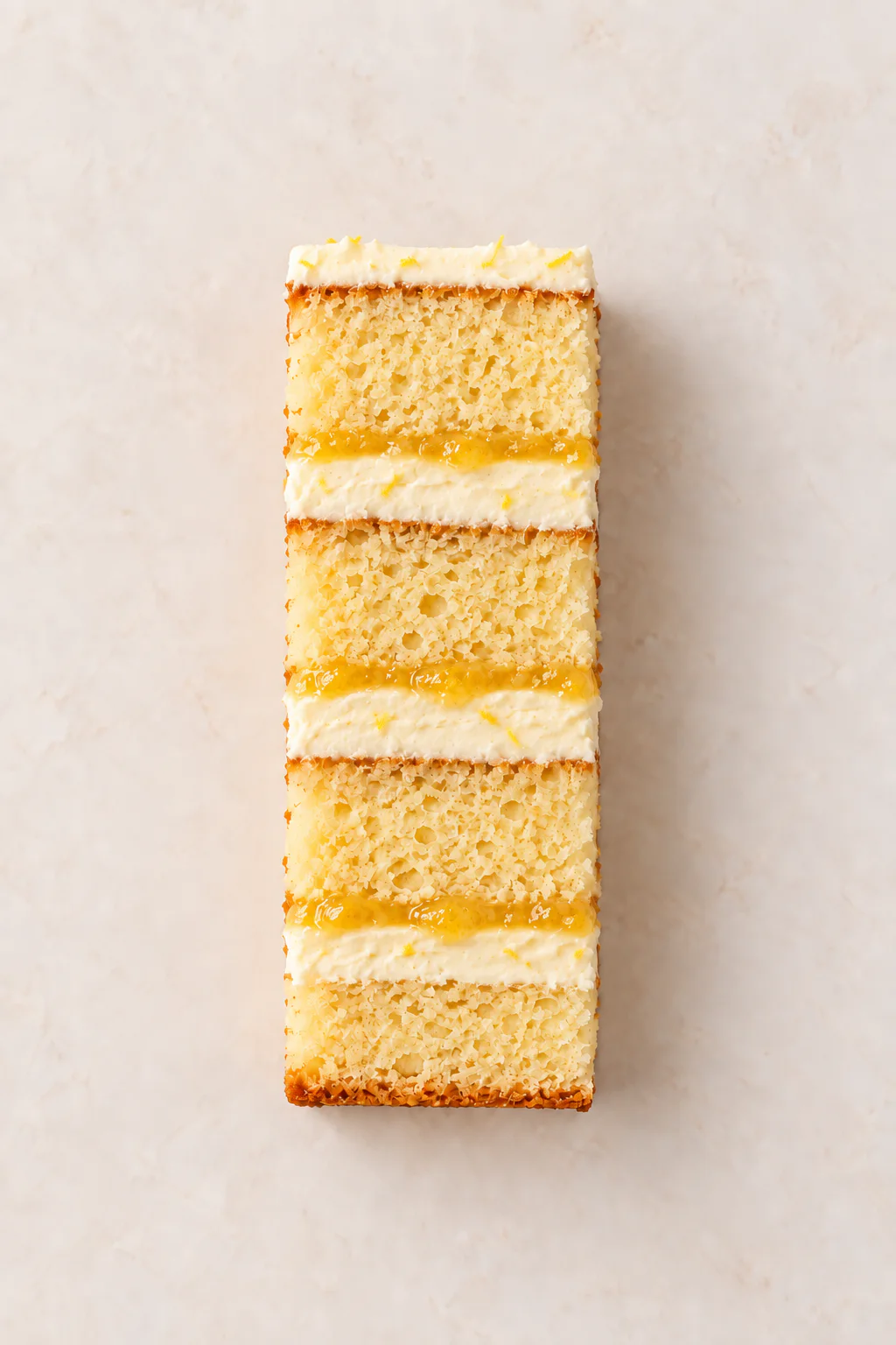 A cut slice of Lemon Cake